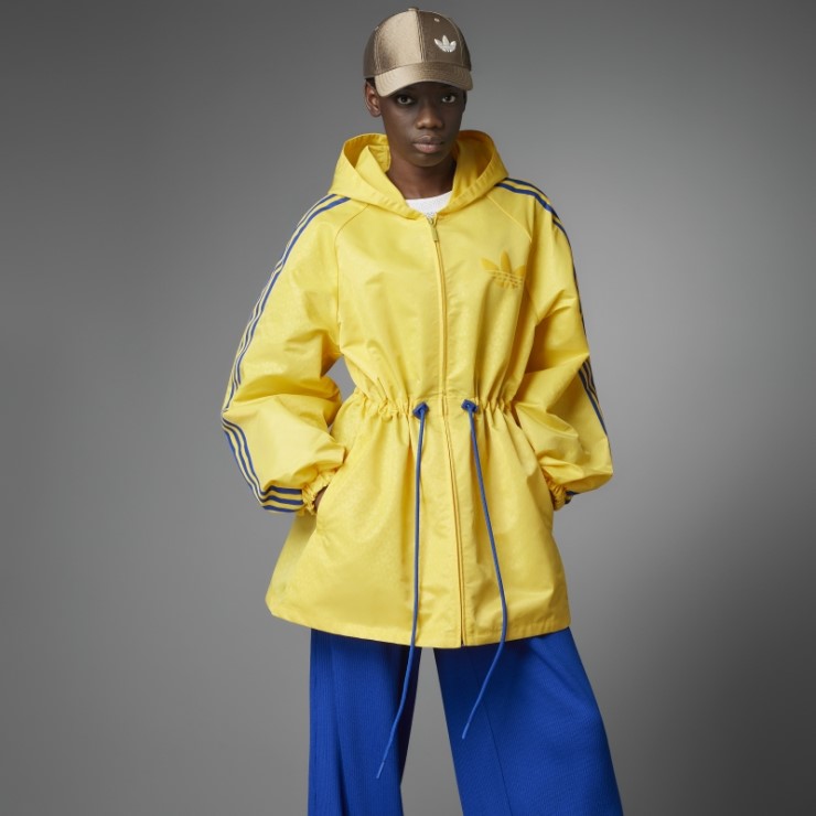 Chaqueta Cortavientos Adidas Adicolor Heritage Now Monogram Dorado