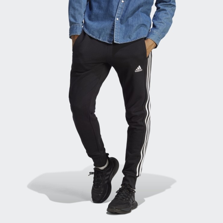 Joggers Negros Con 3 Rayas Y Puños Cónicos De Felpa Francesa Essentials De Adidas