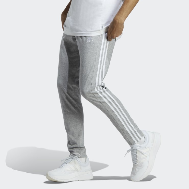 Pantalones Essentials Single Jersey Tapered Open He 3-Stripes Gris Medio Adidas