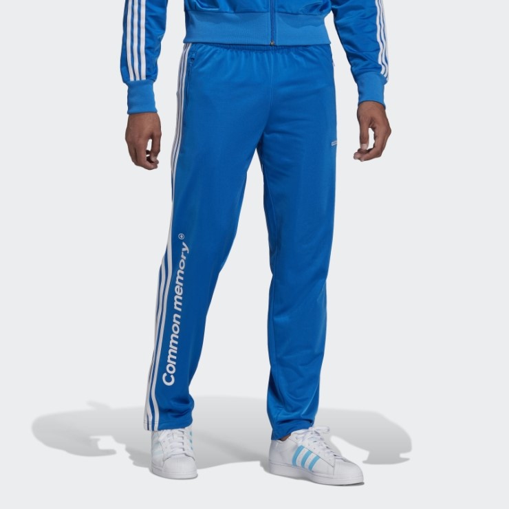 Pantalones De Chándal Con Gráfico De Memoria Común Adidas Pájaro Azul